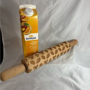 Wooden textured rolling pin.